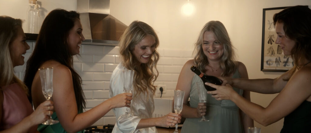 toast with bride and friends