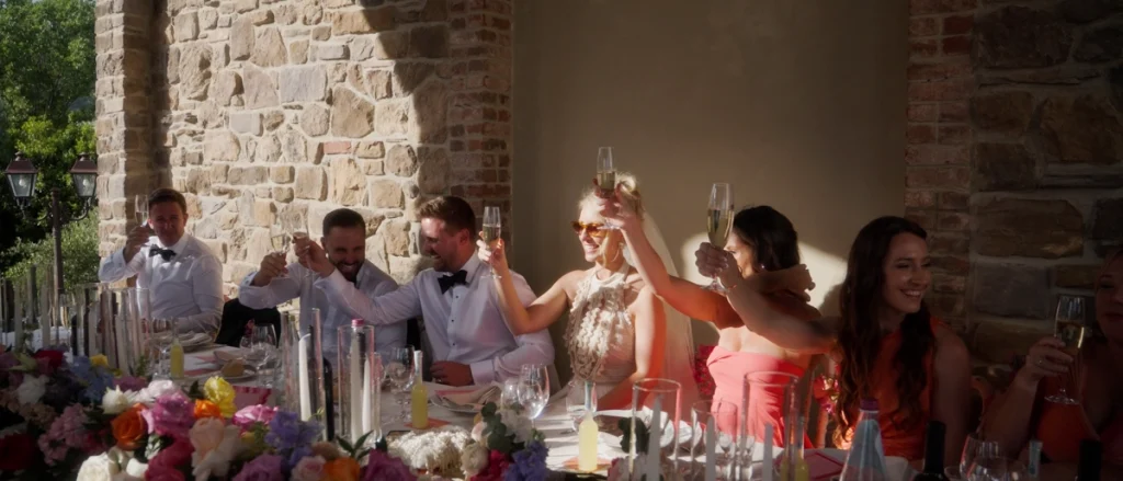 Bride and groom are making a toast