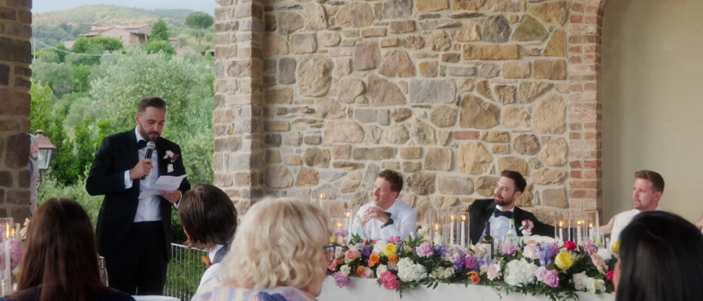 The groom's brother giving a speech 