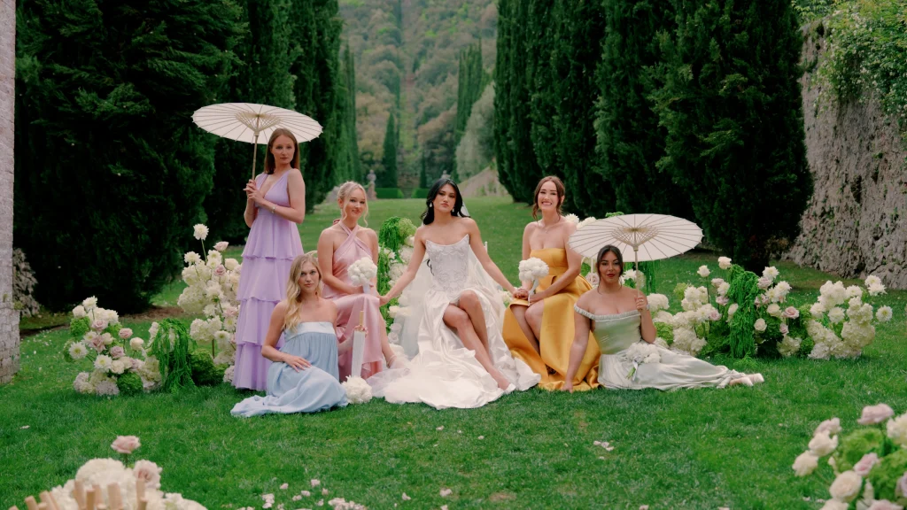 the bride and her bridesmaids shooting in an italian garden