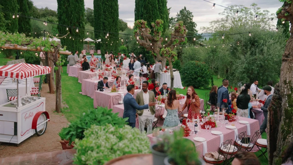 The guests having an aperitif in a garden in Tuscany