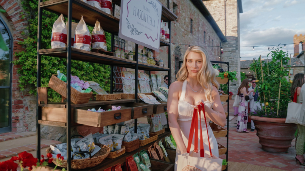 The bride near the shop they prepared for their guests