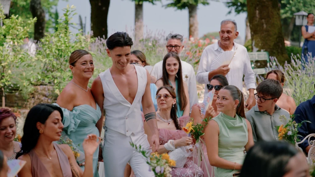 Mattia arrives at the ceremony with his mother