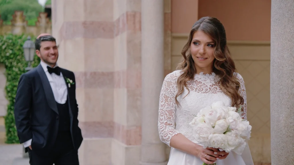 The bride and the groom's first look