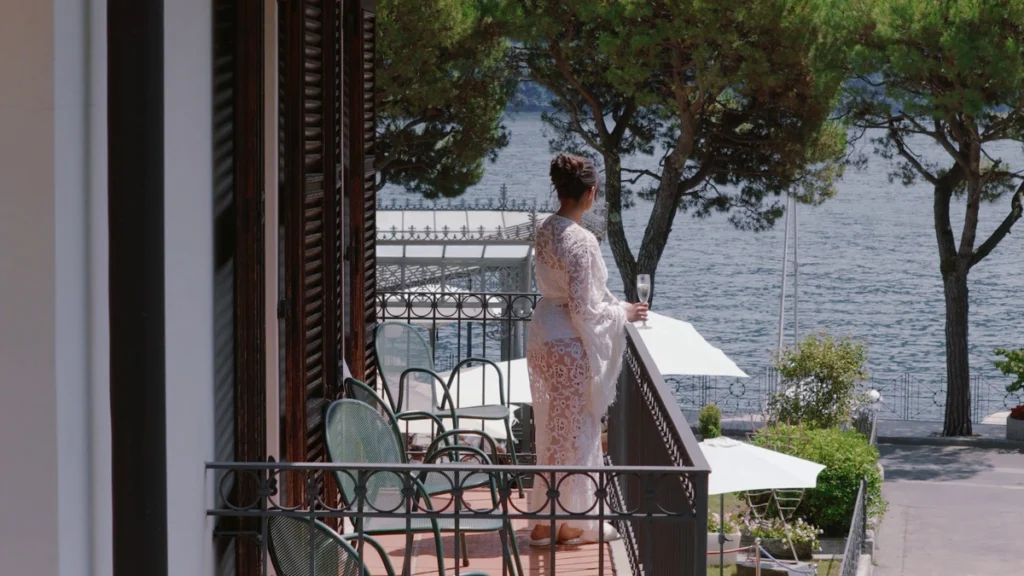 The bride on a balcony facing Lake Como