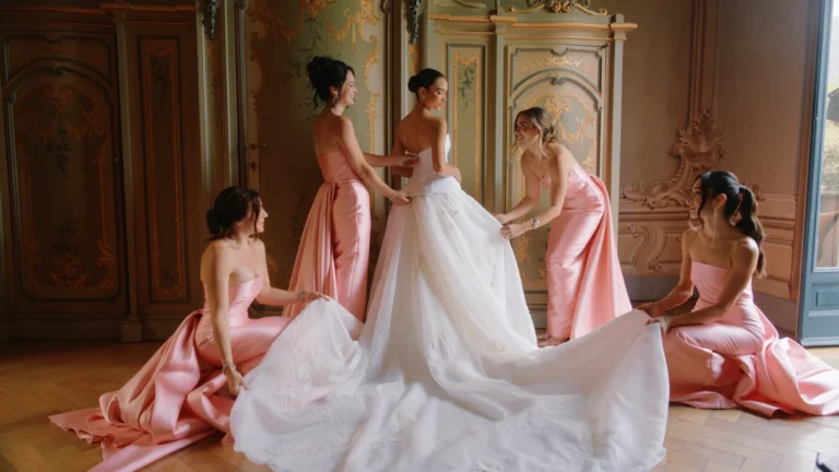 The bride getting ready with her bridesmaids