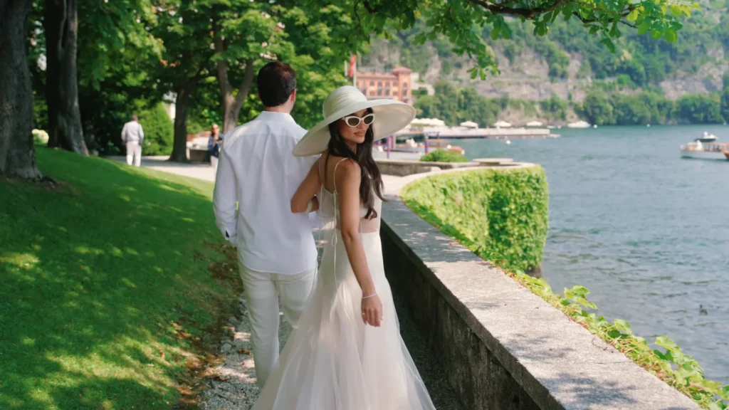 The couple strolls through the gardens of Villa d'Este